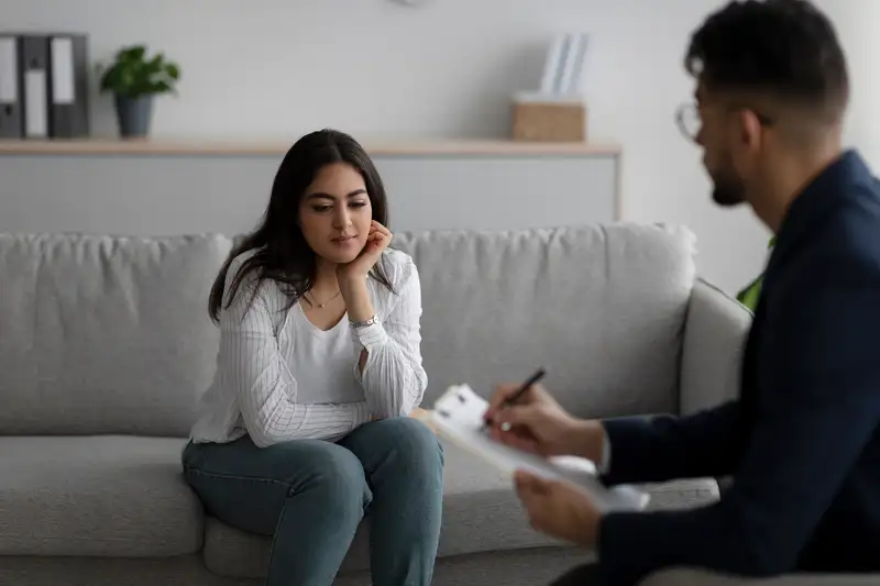 A psychologist or counsellor working with a patient